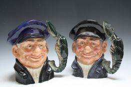 TWO ROYAL DOULTON CHARACTER JUGS - LOBSTER MAN IN TWO COLOURWAYS, the first signed by Michael Doult