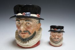 TWO GRADUATING ROYAL DOULTON CHARACTER JUGS - BEEFEATER, consisting of medium D6233 and large, H 19