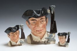 THREE GRADUATING ROYAL DOULTON CHARACTER JUGS FROM WILLIAMSBURG - GUNSMITH, consisting of small D65