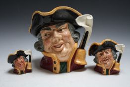 THREE GRADUATING ROYAL DOULTON CHARACTER JUGS - TOWN CRIER, consisting of small D6544, medium D6537
