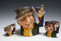 THREE GRADUATING ROYAL DOULTON CHARACTER JUGS - PUNCH AND JUDY MAN, consisting of small , medium D6