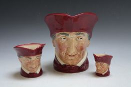 THREE GRADUATING CHARACTER JUGS - THE CARDINAL, consisting of small, medium and large D5327, H 16 c