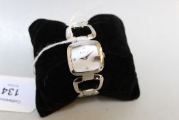 A GUCCI LADIES WRISTWATCH, with open metallic bracelet, no box