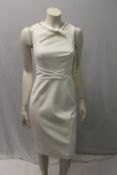 KAREN MILLEN, a ladies white / ivory dress, slashed and crossed to front, size UK 8