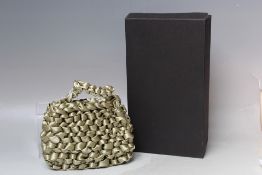 A MIISTA SMALL PLAITED EFFECT SAGE GREEN HANDBAG, single carry handle with press stud fastening