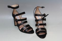 A PAIR OF L.K. BENNETT BLACK GLADIATOR HEEL SHOES, size EU 38 1/2