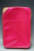 A RARE LOUIS VUITTON PINK VERNIS MONOGRAM SUITCASE, with a leather strap handles and banding,