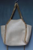 A STELLA MCCARTNEY CALFSKIN BUCKET STYLE HANDBAG, chain link handles with additional shoulder chain,