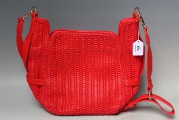 AN ESSENTIAL ANTWERP PRISCILLA RED WOVEN STYLE SHOULDER BAG WITH STRAP, W 37 cm