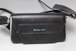 A PRADA BLACK LEATHER MILANO LADIES HANDBAG, with magnetic fastening, W 26 cm