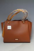 A ALDO TOTE TAN COLOURED BAG, with twin mustard coloured handles and optional shoulder strap,