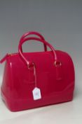 A FURLA JELLY PINK BARREL CANDYBAG, twin handled, with luggage tag, zip closure, dust bag, H 22