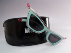 A PAIR OF RETRO 1950S STYLE MOSCHINO 'LIPSTICK' SUNGLASSES IN TURQUOISE, new / old stock with case