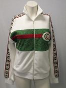 GUCCI, a ladies white track top with green panel