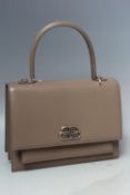 A BALENCIAGA TRADITIONAL STYLE COFFEE COLOURED HANDBAG, loop handle, stud fastening with release