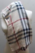 A BURBERRY TRADITIONAL CHECK LIGHTWEIGHT CAMEL SCARF, fringe detail to ends, approx L 180 cm W 68
