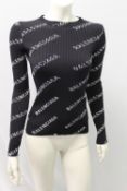 BALENCIAGA, a ladies black ribbed top, size 6
