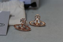 A BOXED PAIR OF VIVIENNE WESTWOOD PINK GOLD-TONE CUBIC ZIRCONIA ORB EARRINGS