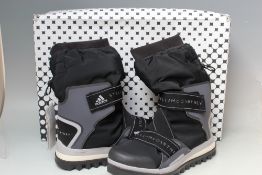 A PAIR OF STELLA MCCARTNEY FOR ADIDAS WINTER BOOTS, UK size 8, boxed