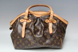 A LOUIS VUITTON MONOGRAM TIVOLI HANDBAG, double loop leather handles and leather straps, the