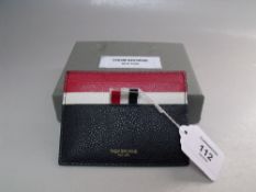 A BOXED THOM BROWNE OF NEW YORK CARD WALLET, multi colour grained leather with card slots to both