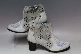 A PAIR OF DEZIGUAL ANKLE BOOTS, size EU 41, green suede lazer cut cow girl boot with tiger pattern