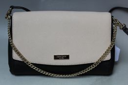 A KATE SPADE CREAM AND BLACK HANDBAG WITH SHOULDER STRAP, W 27 cm