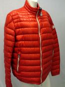 MONCLER, a ladies red puffa jacket, size 14 / 16