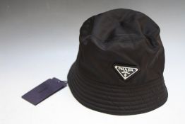 A PRADA BACK SHOWERPROOF HAT - SIZE L