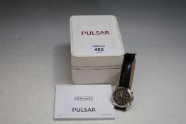 A PULSAR WRIST WATCH AND BOX, DIA 4 CM