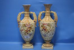 A PAIR OF TWIN HANDLED VASES, NO MARKS TO BASE