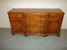 A MODERN BREAKFRONT SIDEBOARD