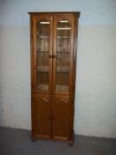 A PINE NARROW GLAZED DISPLAY UNIT.