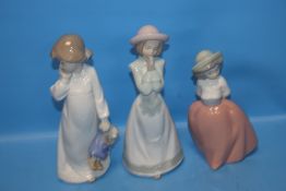 THREE BOXED NAO FIGURES