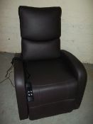 A BROWN RISE AND RECLINE CHAIR.