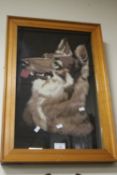 A FRAMED AND GLAZED WOOL WORK PICTURE OF A GERMAN SHEPHERD DOG