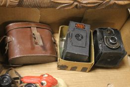 A SMALL TRAY TO INCLUDE A PAIR OF 'EAGLE EYE' BINOCULARS AND AN ENSIGN CADET CAMERA, A FULL VUE