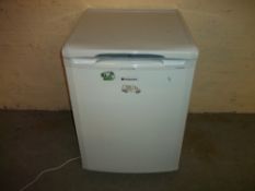 A HOTPOINT UNDER COUNTER FRIDGE