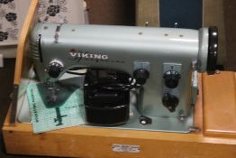 A VIKING HUSQVARNA CASED SEWING MACHINE