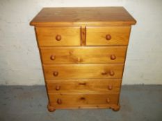 TWO OVER FOUR SOLID PINE CHEST OF DRAWERS.