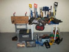 A SELECTION OF TOOLS TO INCLUDE A WORKMAT, STORAGE STEPS, SAWS AND A SCREWDRIVER SET.