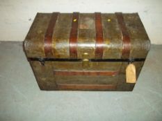 A STEEL COVERED 1950S TRAVEL TRUNK