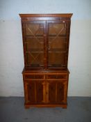A YEW GLAZED BOOKSHELF DISPLAY CABINET.