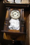 A MAHOGANY WALL CLOCK