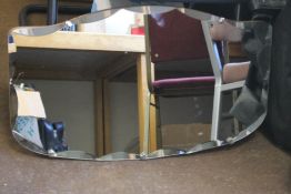 A HANGING WALL MIRROR