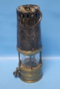 A VINTAGE MINERS LAMP MANUFACTURED BY RICHARD JOHNSON AND RALPH M. MORRISON & CO. OF MANCHESTER