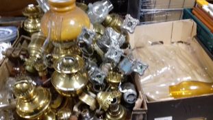 A LARGE QUANTITY OF PARAFFIN AND OIL LAMPS AND A BOX OF LAMP FLUTES ETC.