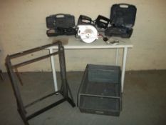 A SELECTION OF POWER TOOLS AND ADJUSTABLE TRESSLE AND A GALVANIZED STORAGE CONTAINER.