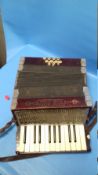 A VINTAGE PIANO ACCORDIAN 'THE MAJESTIC'