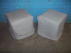TWO MATCHING LINLEY POUFFES